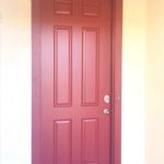 Six panel smooth fiberglass door painted and installed by Precision Fit Door and Window.